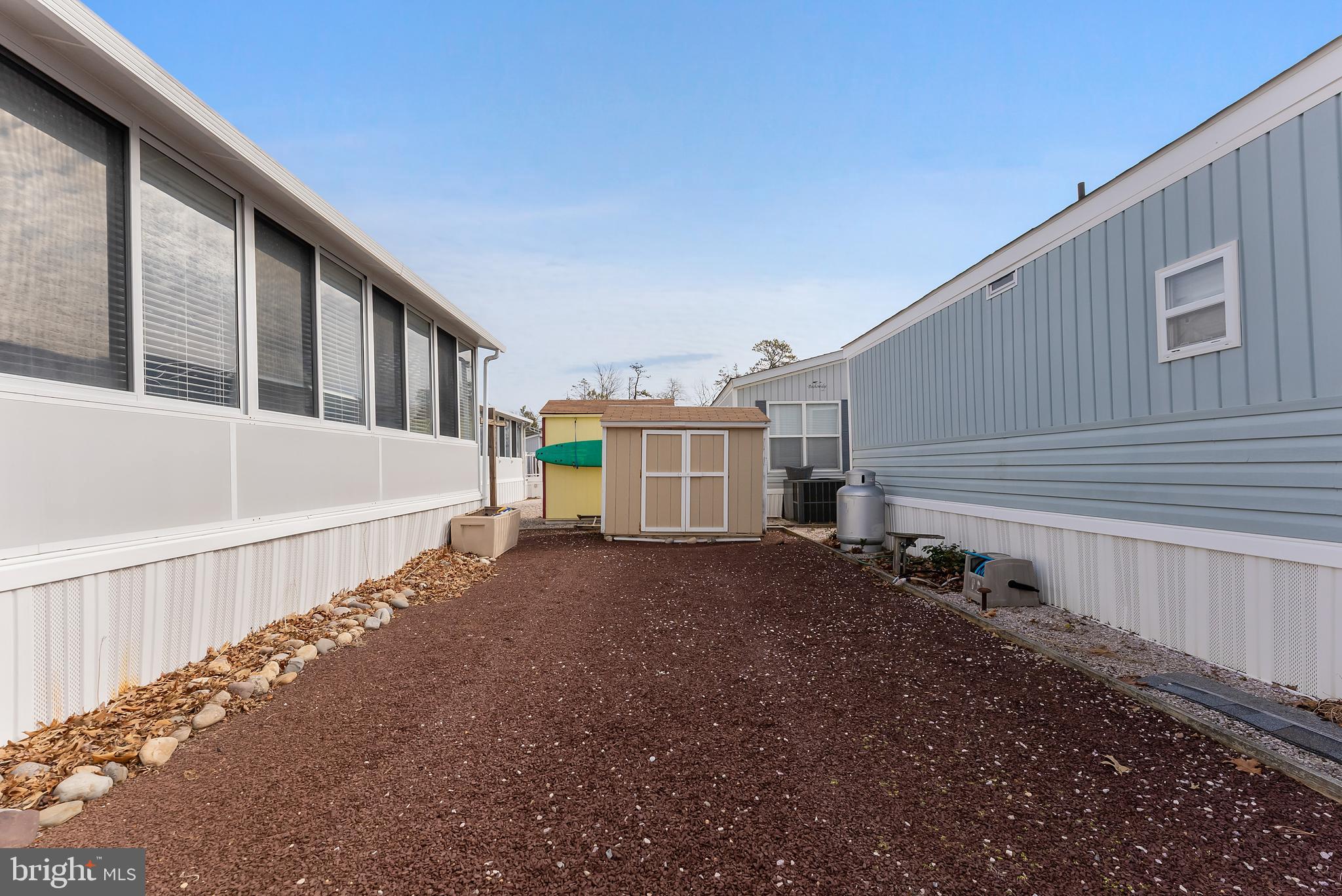169 Edson, Unit 169 Woodbine, NJ 08270 - Photo 26 of 45 a view of an house with backyard and garden