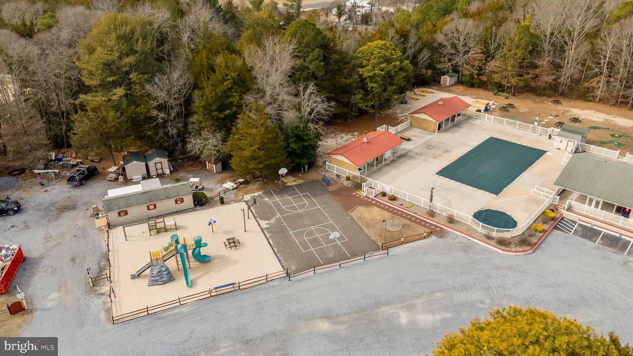 169 Edson, Unit 169 Woodbine, NJ 08270 - Photo 31 of 45 an aerial view of a house with swimming pool and sitting space