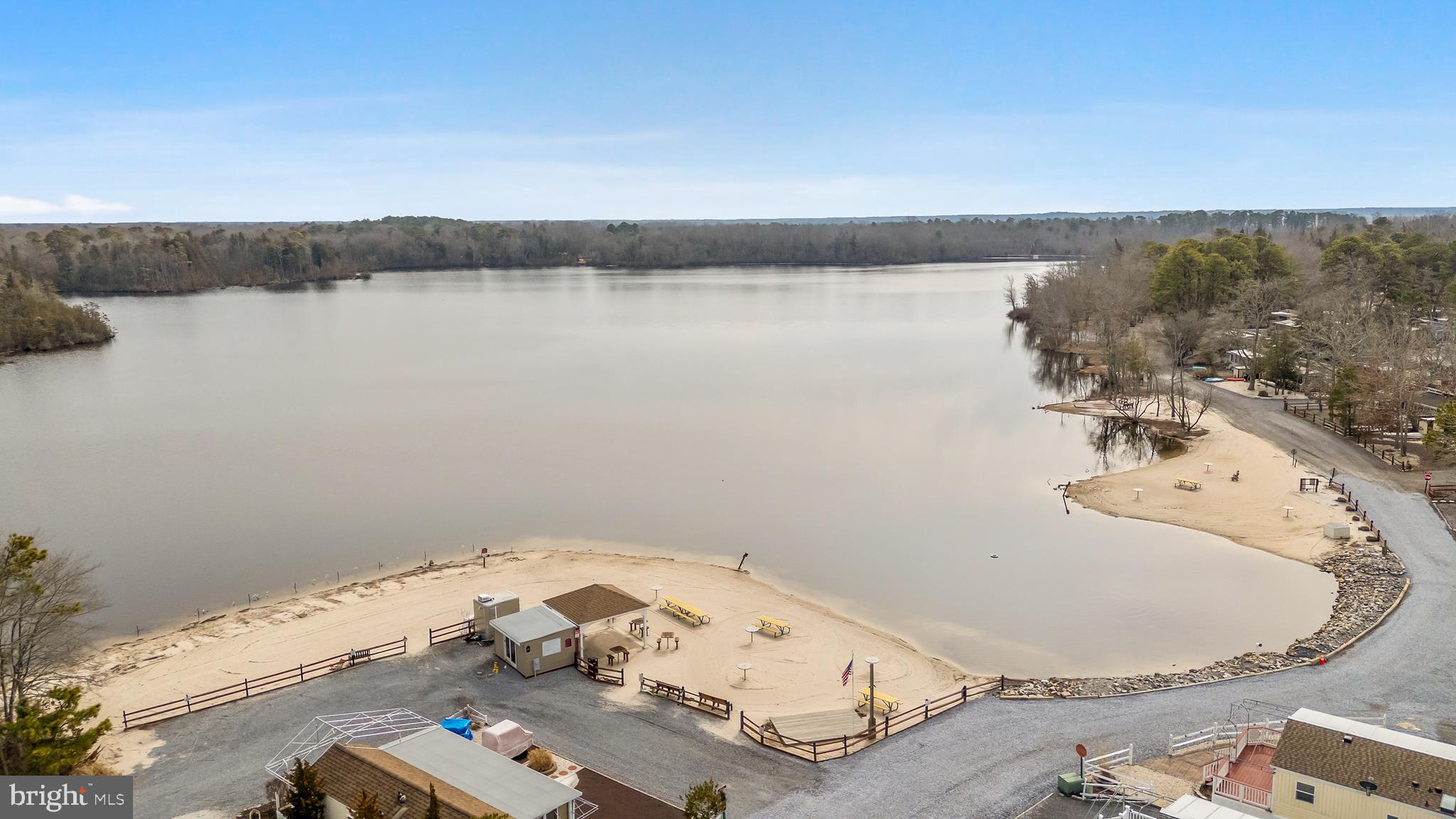 169 Edson, Unit 169 Woodbine, NJ 08270 - Photo 45 of 45 wooden floor with a view of roof and city view