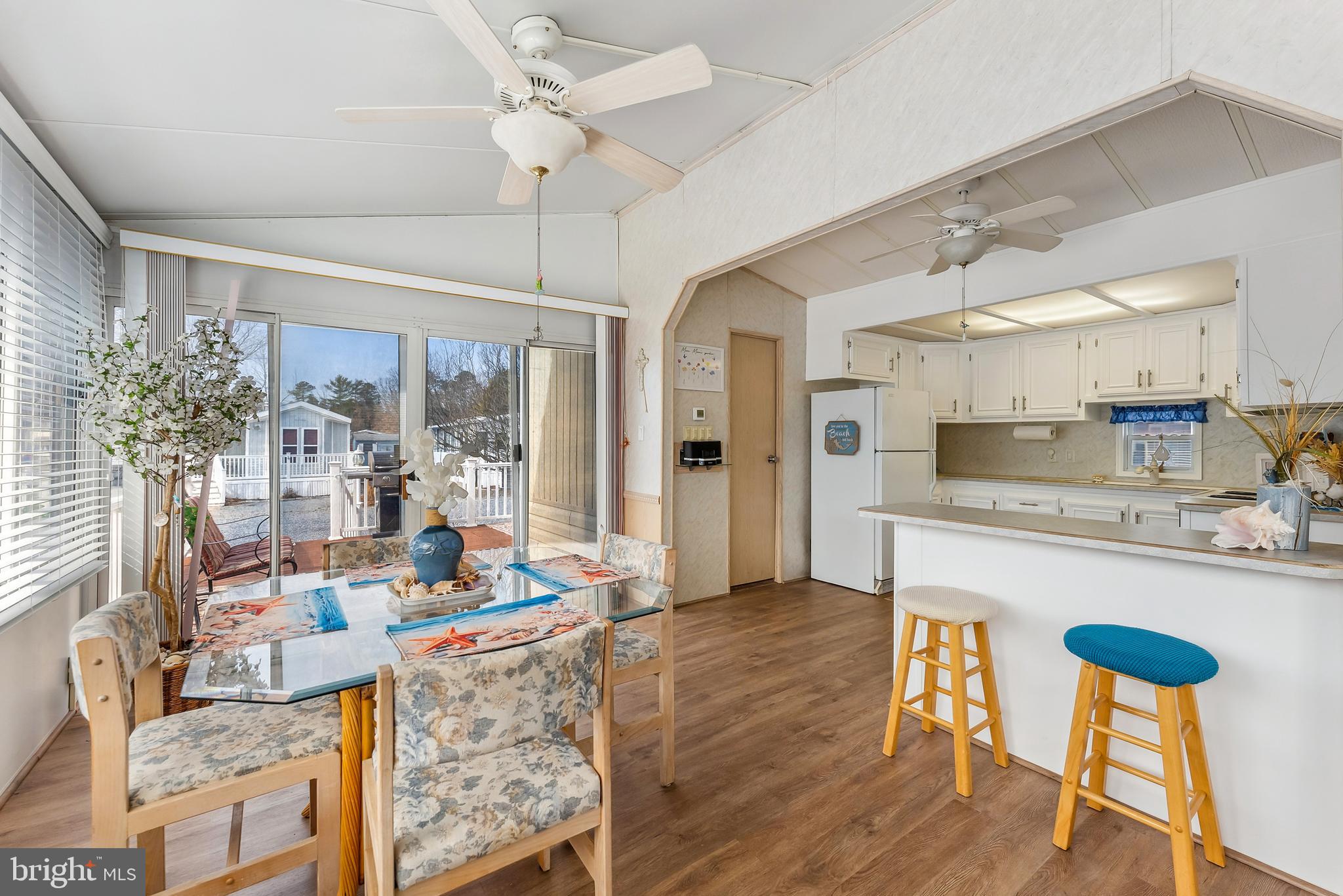 169 Edson, Unit 169 Woodbine, NJ 08270 - Photo 5 of 45 a living room with stainless steel appliances granite countertop furniture and a kitchen view