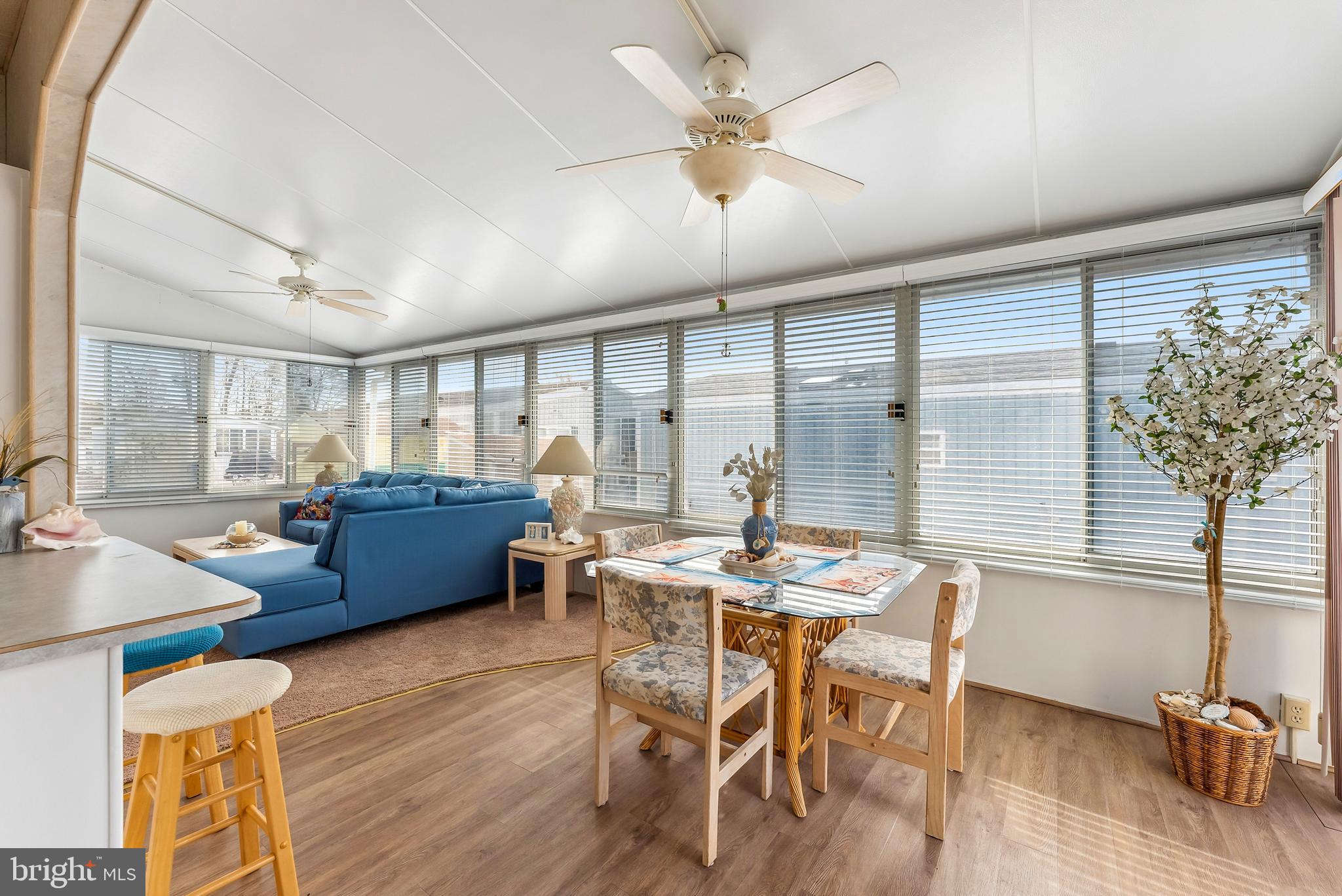169 Edson, Unit 169 Woodbine, NJ 08270 - Photo 8 of 45 a living room with furniture and a large window