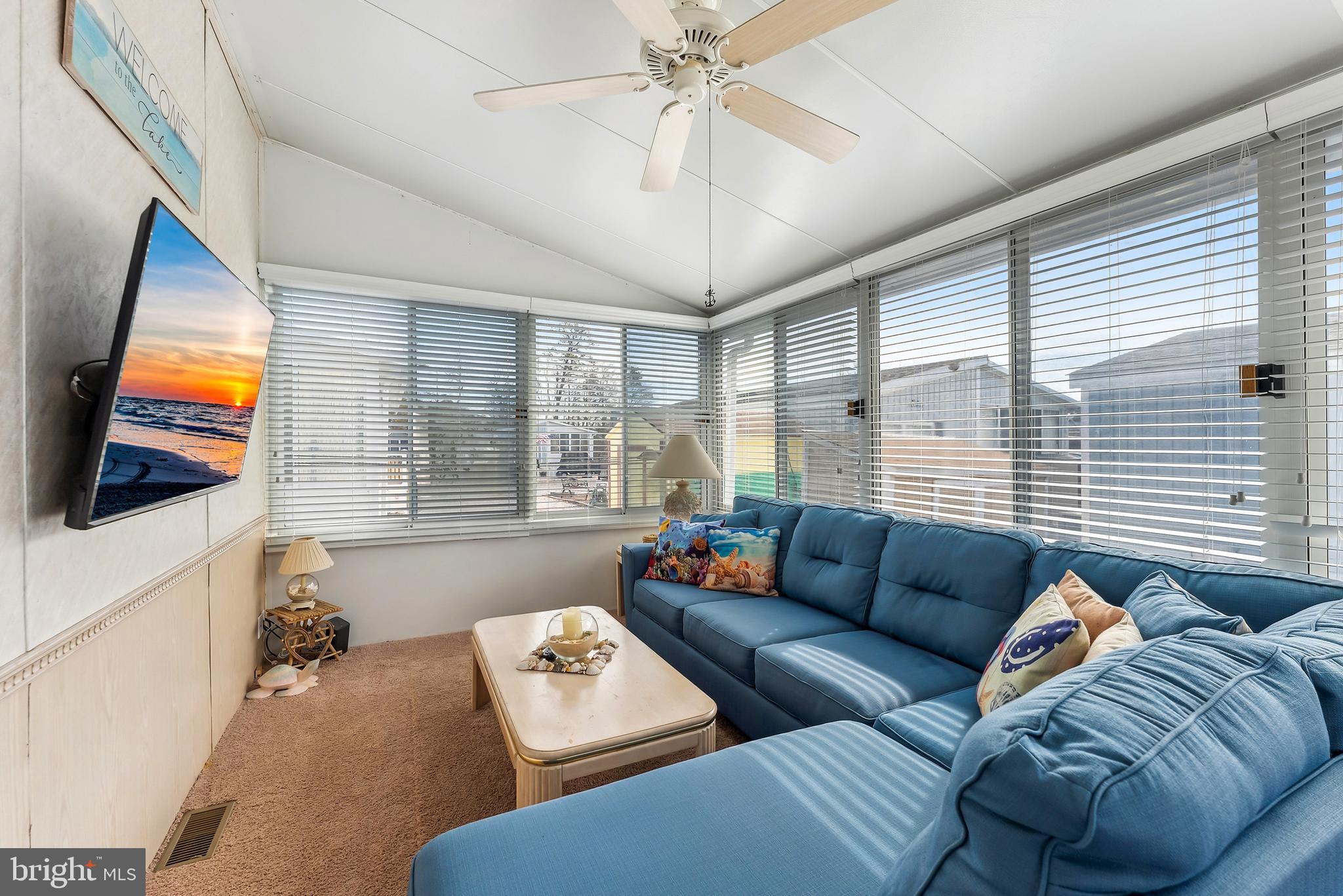 169 Edson, Unit 169 Woodbine, NJ 08270 - Photo 9 of 45 a living room with furniture and a flat screen tv