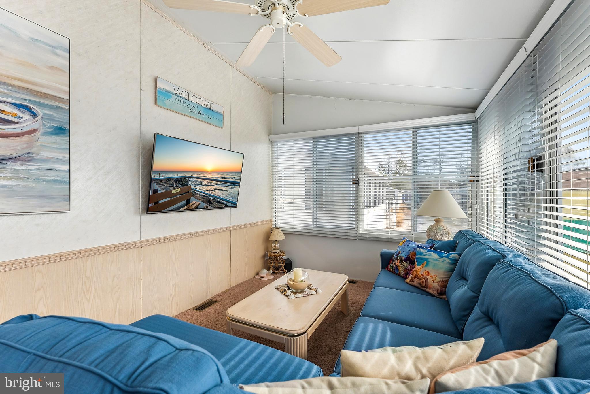 169 Edson, Unit 169 Woodbine, NJ 08270 - Photo 10 of 45 a living room with furniture and a window