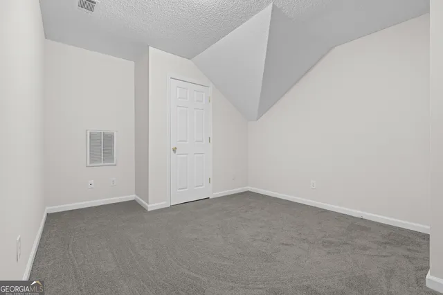 an empty room with an entryway