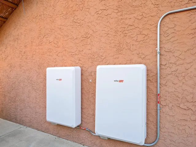 a patio with yard table and chairs