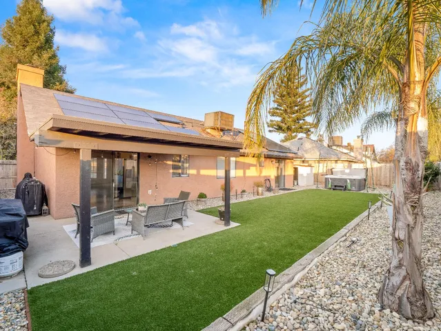 a view of a backyard with a garden