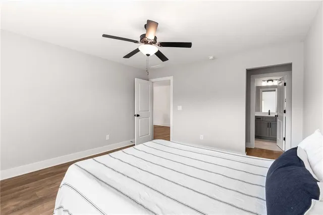 a bathroom with a sink a toilet and bathtub