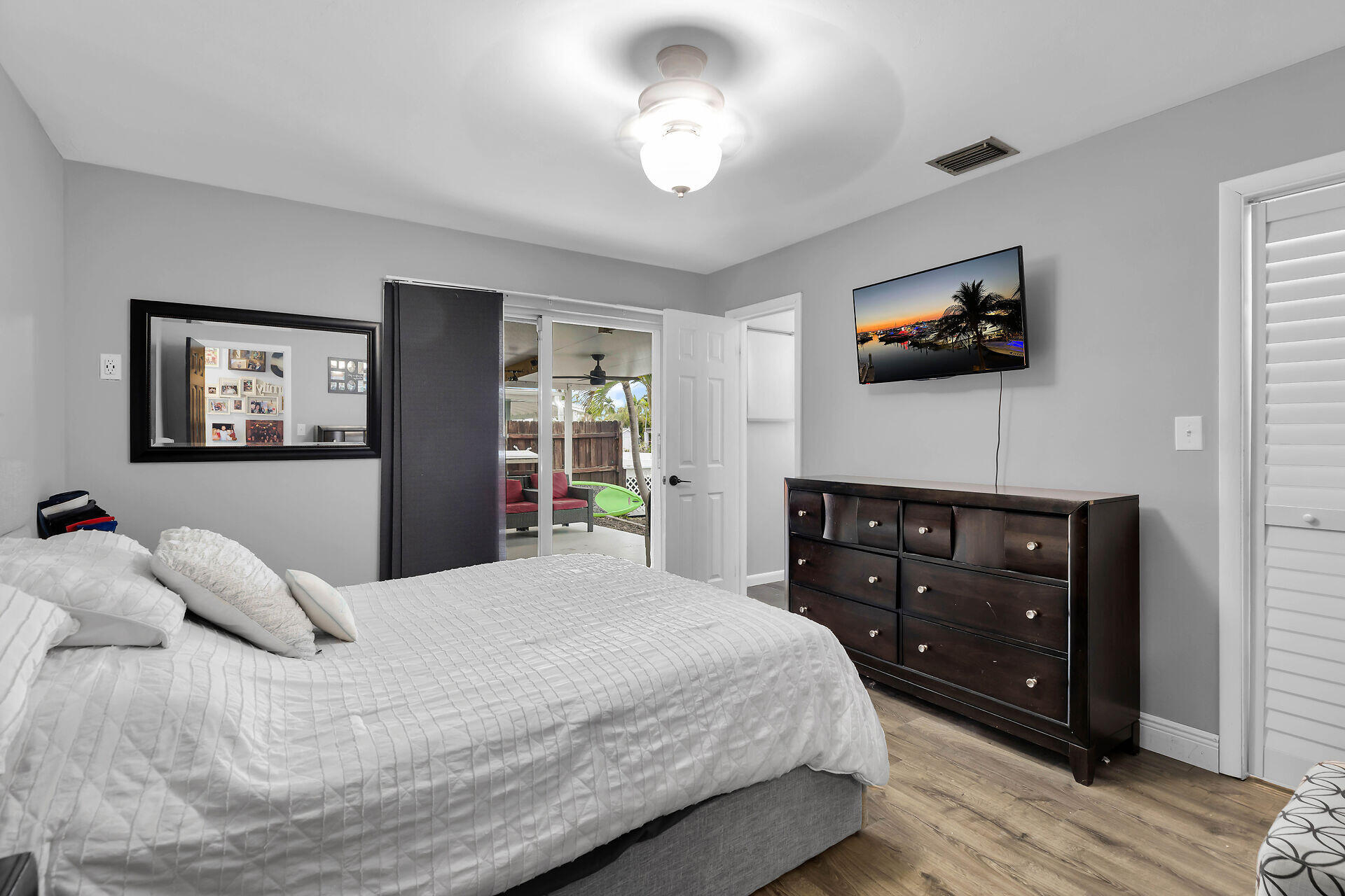34 Key Haven Road Key Haven, FL 33040 - Photo 22 of 34 a bedroom with a bed and a flat screen tv