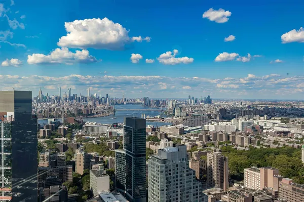 a view of a city with tall buildings