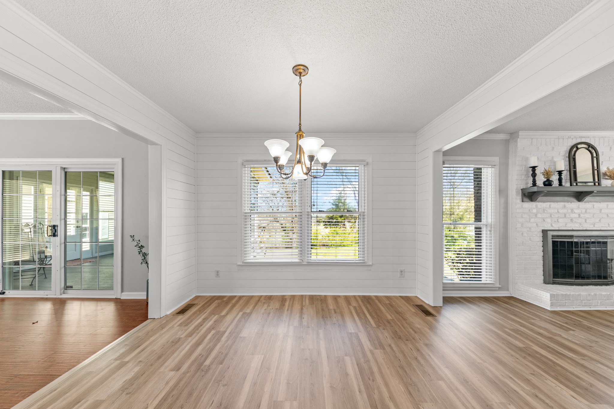 1336 Charlotte Drive Pulaski, TN 38478 - Photo 15 of 65 a view of an empty room with window and wooden floor