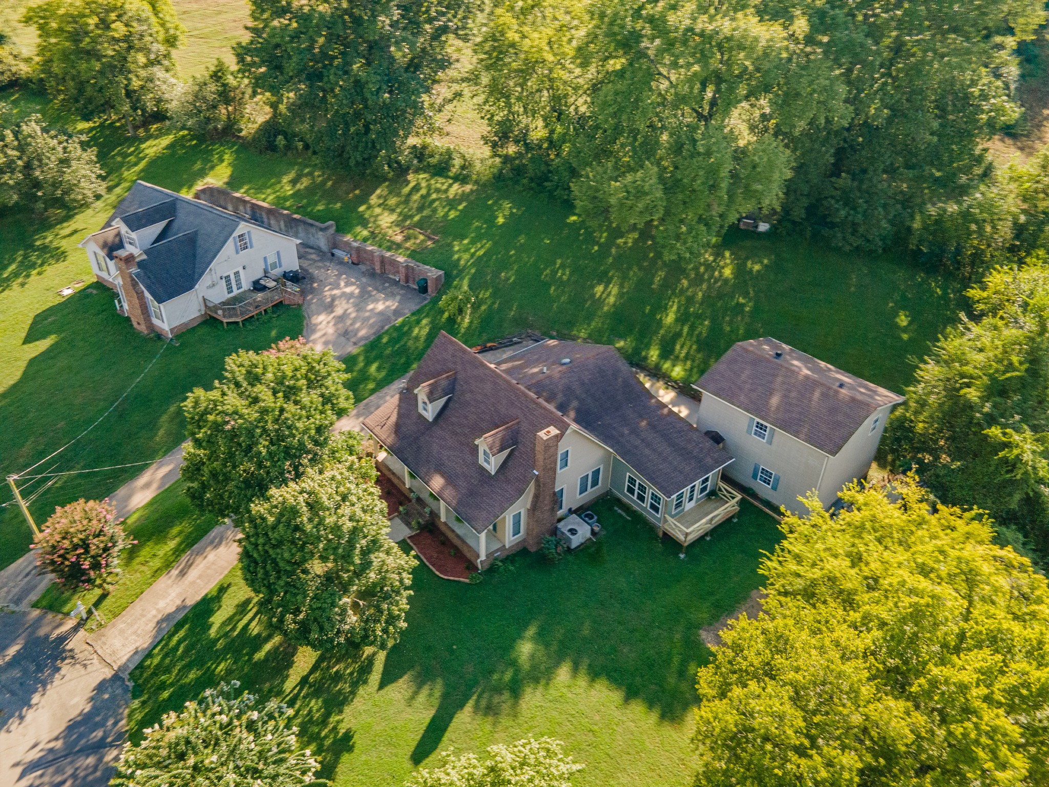 1336 Charlotte Drive Pulaski, TN 38478 - Photo 2 of 65 an aerial view of a house with garden space and street view