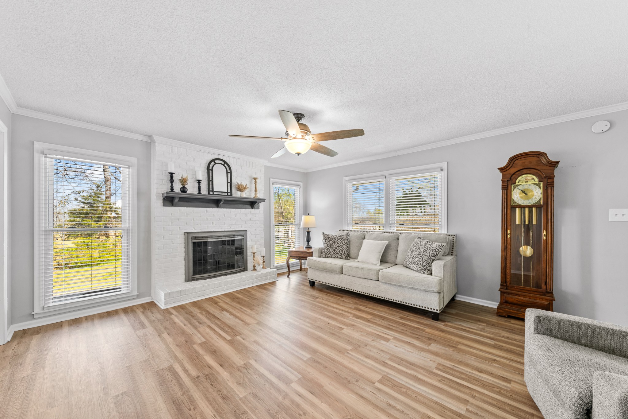 1336 Charlotte Drive Pulaski, TN 38478 - Photo 25 of 65 a living room with furniture and a fireplace