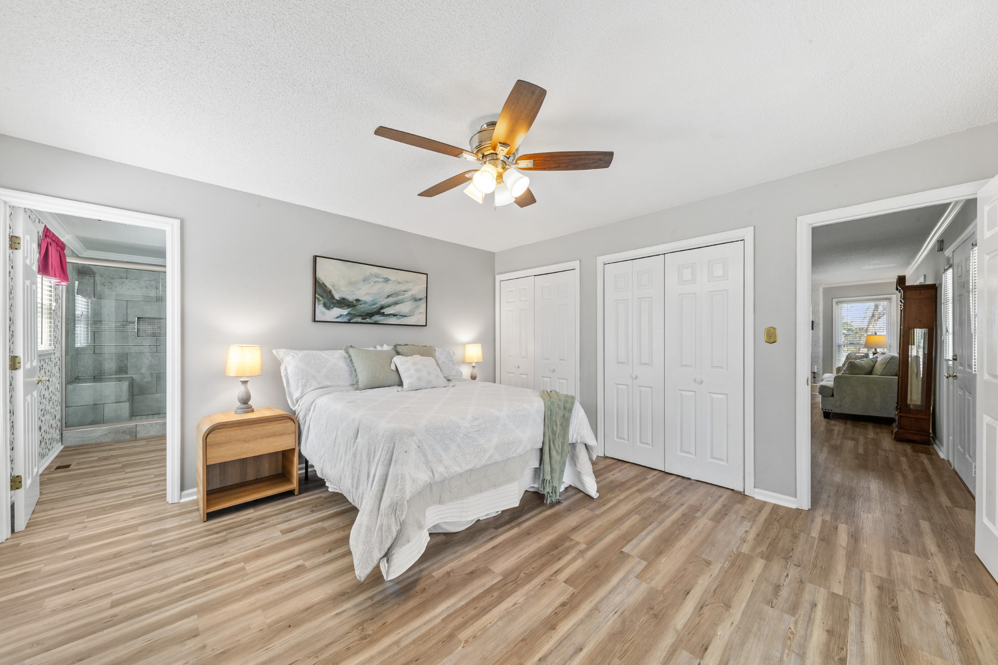 1336 Charlotte Drive Pulaski, TN 38478 - Photo 29 of 65 a bedroom with a bed and a chandelier