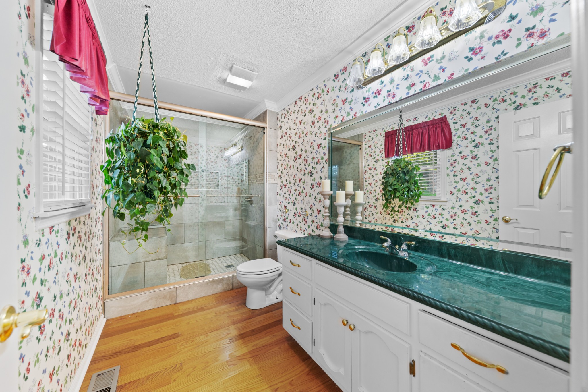 1336 Charlotte Drive Pulaski, TN 38478 - Photo 30 of 65 a bathroom with a sink a toilet and shower