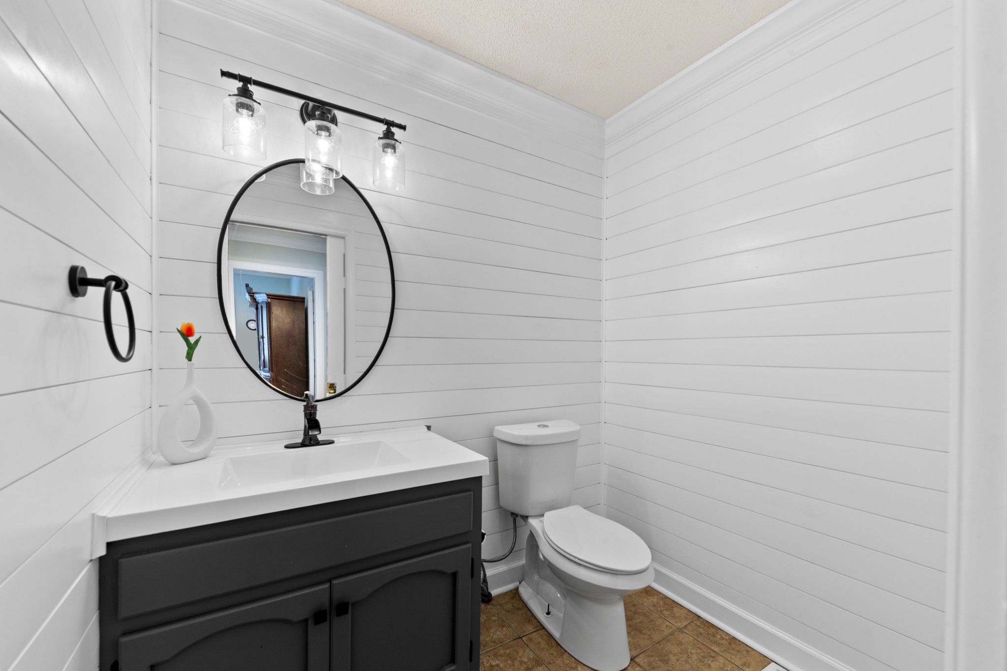 1336 Charlotte Drive Pulaski, TN 38478 - Photo 37 of 65 a bathroom with a sink mirror and toilet