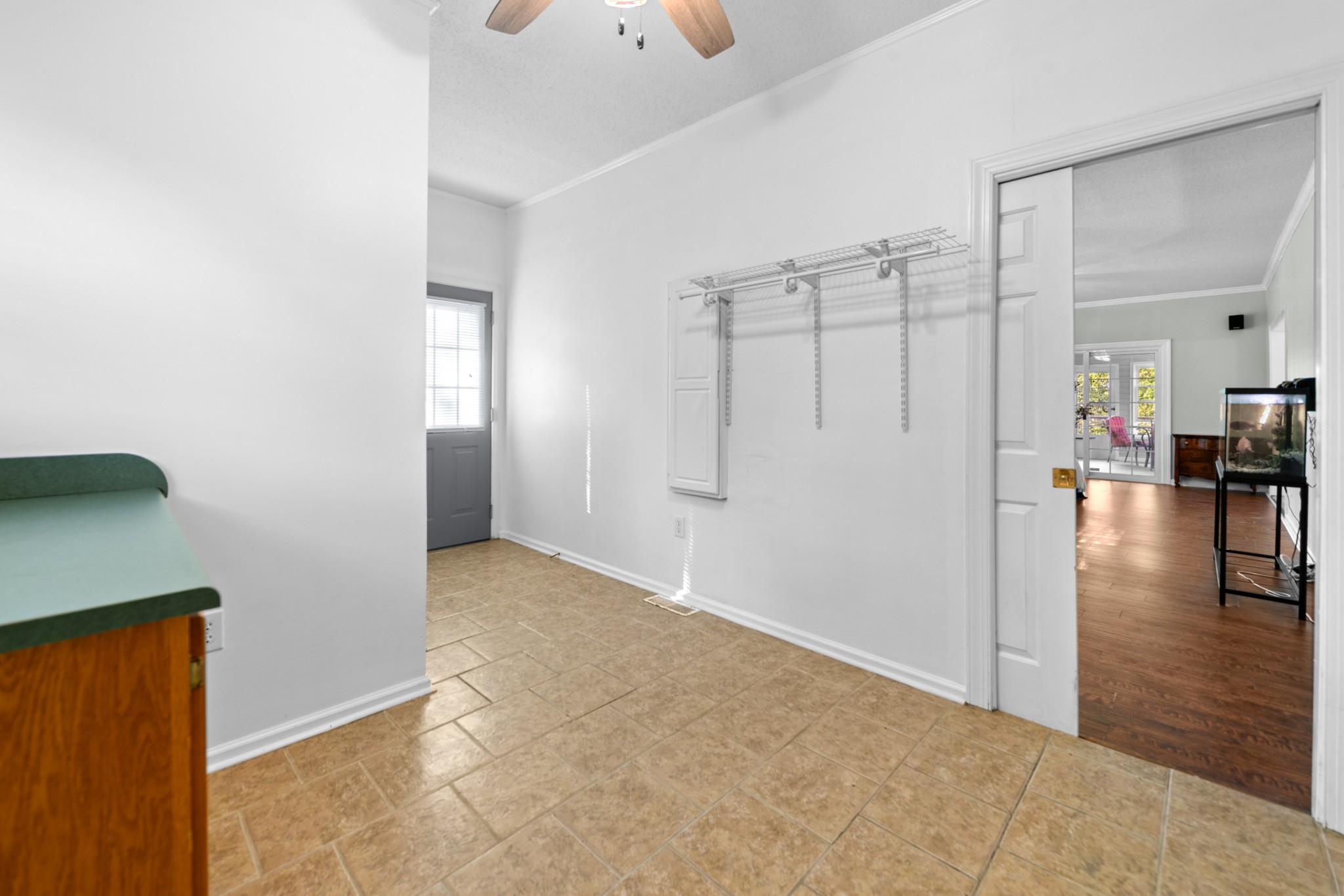 1336 Charlotte Drive Pulaski, TN 38478 - Photo 41 of 65 an empty room with wooden floor and windows