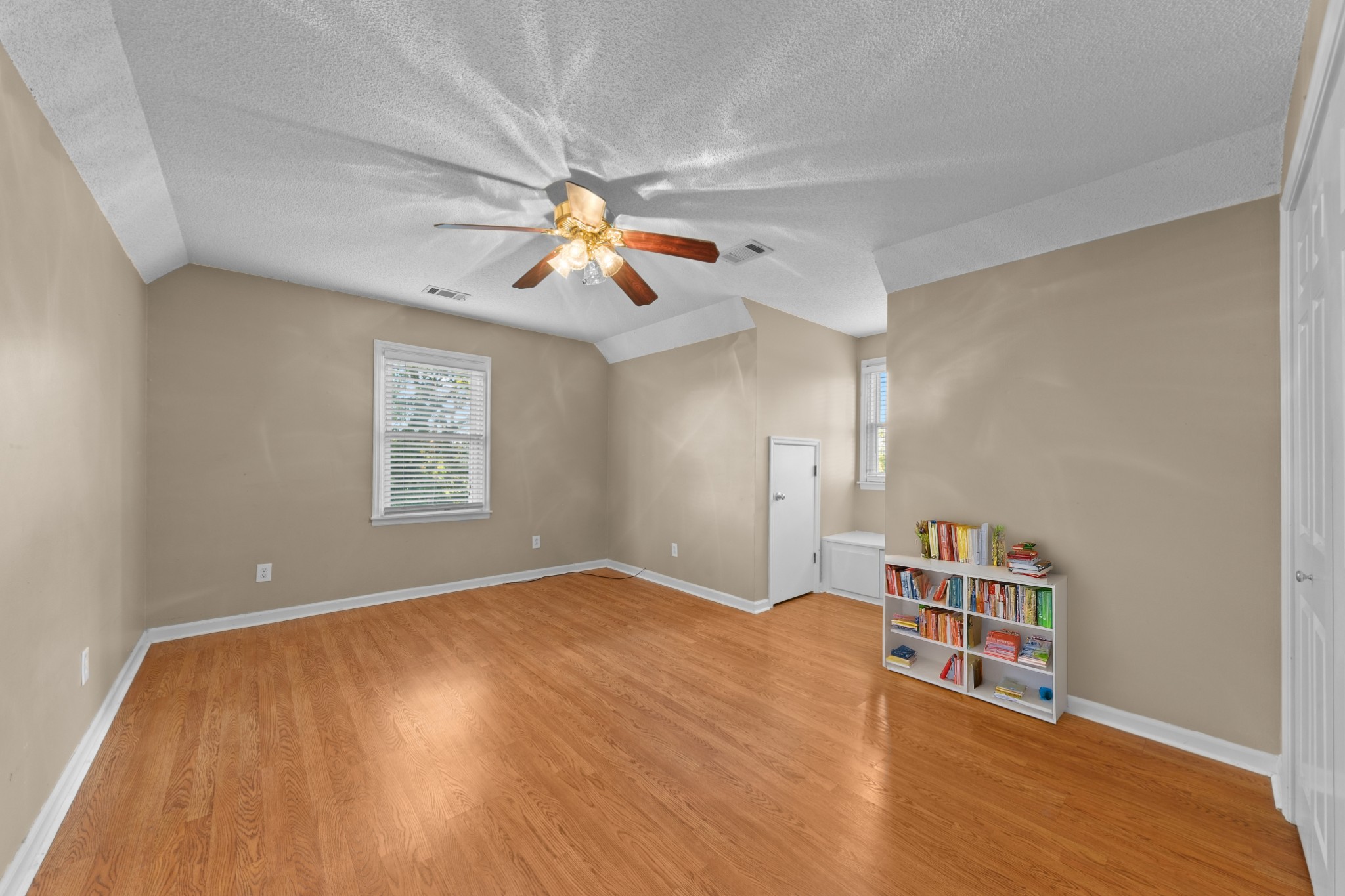 1336 Charlotte Drive Pulaski, TN 38478 - Photo 43 of 65 wooden floor in an empty room with a window
