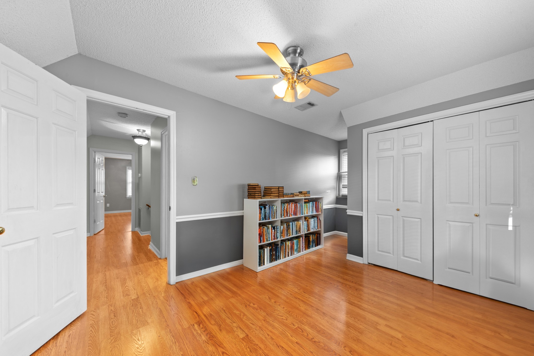1336 Charlotte Drive Pulaski, TN 38478 - Photo 51 of 65 a view of a bedroom with closet and wooden floor