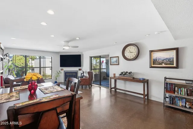 a view of a livingroom with furniture window and wooden floor