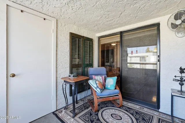 a view of a city that has lawn chairs