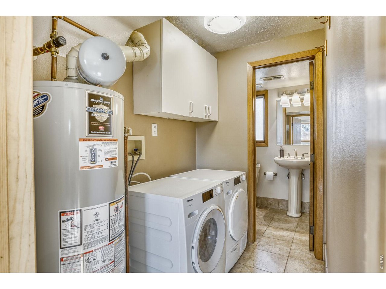 1270 Lehigh Street Boulder, CO 80305 - Photo 19 of 24 Laundry and 1/2 bath on the lower level