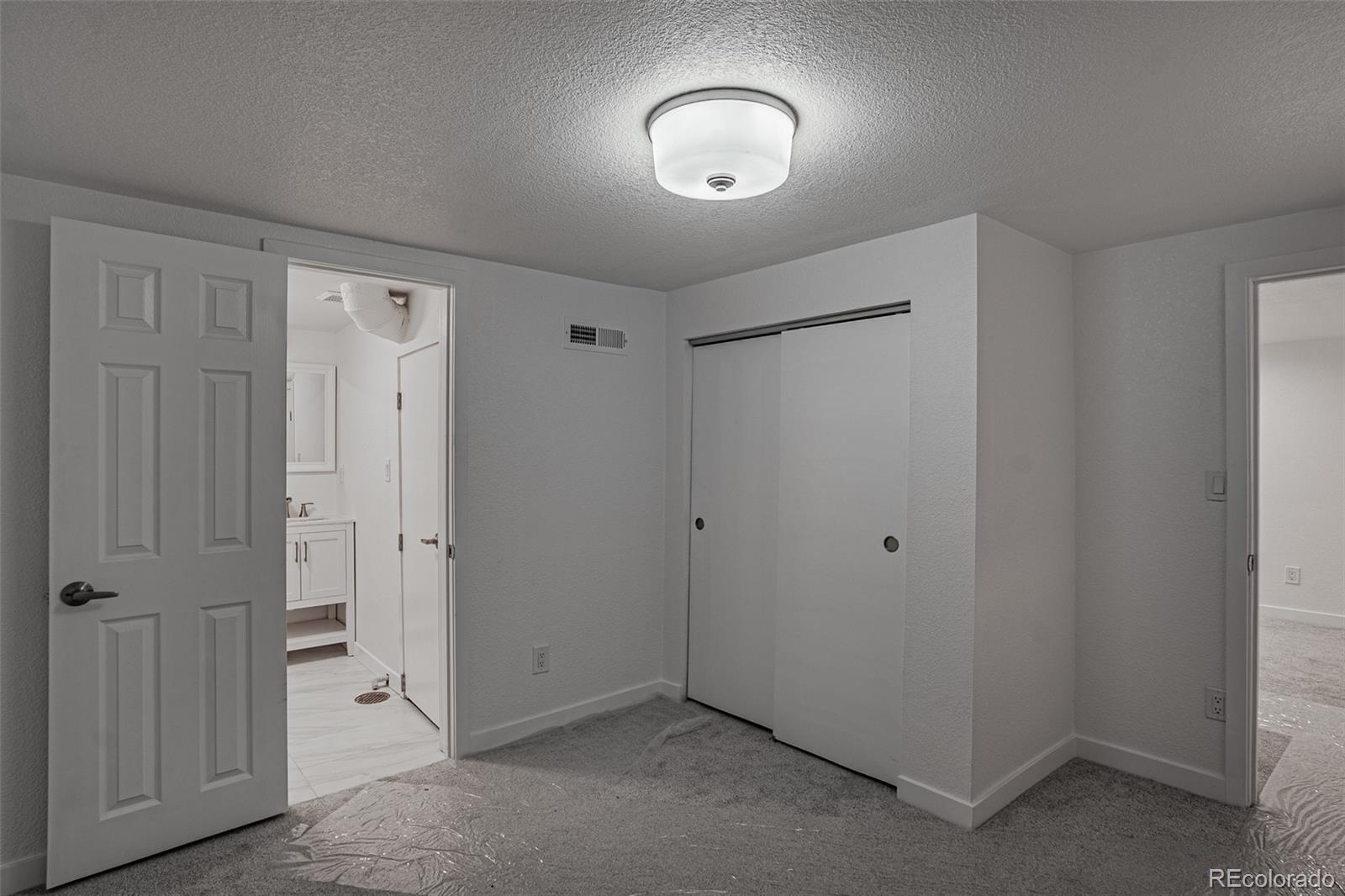 3360 Magnolia Street Denver, CO 80207 - Photo 23 of 31 a view of an empty room