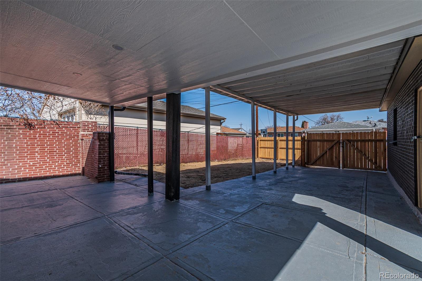 3360 Magnolia Street Denver, CO 80207 - Photo 28 of 31 a view of empty room with wooden floor