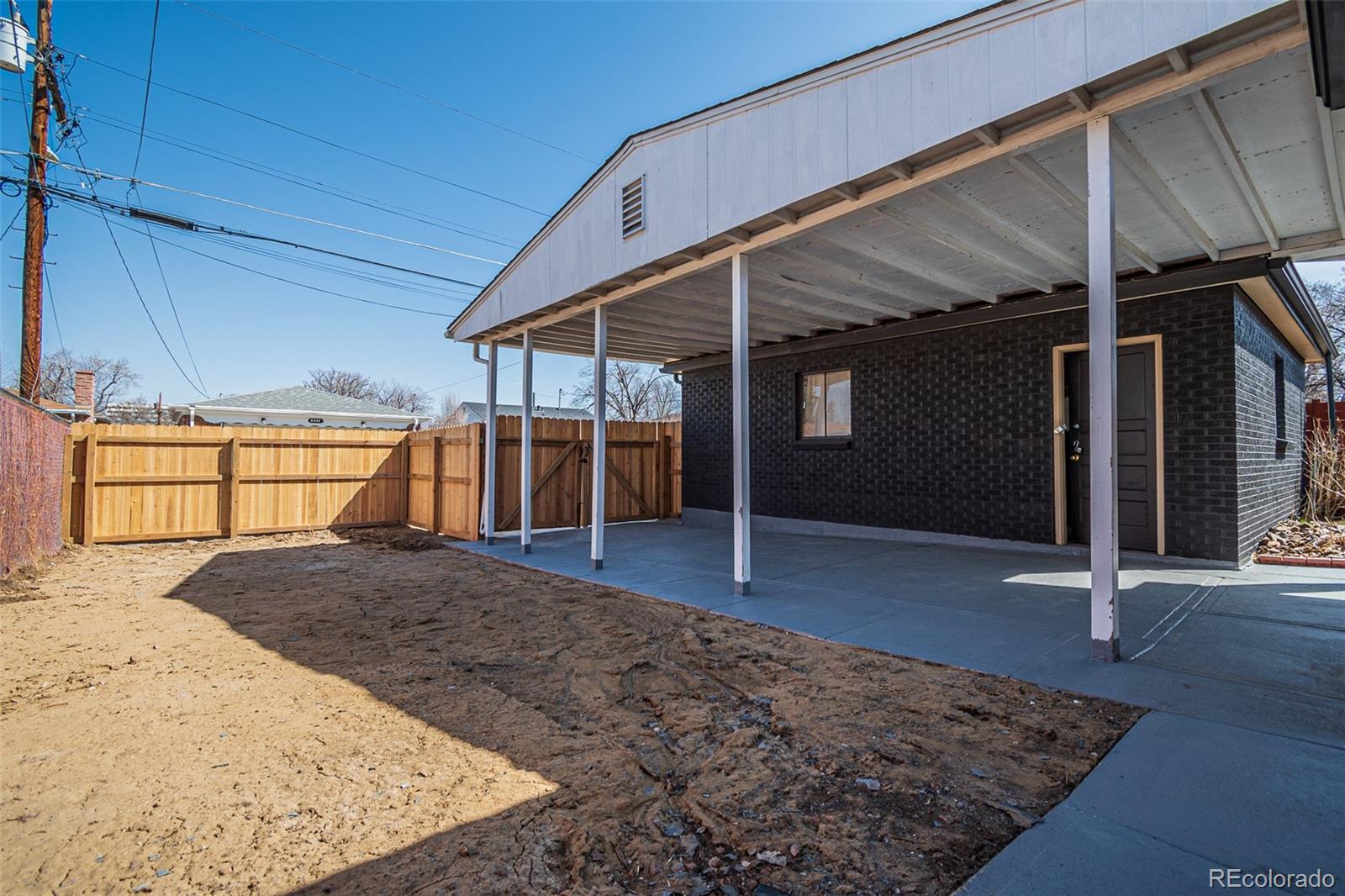 3360 Magnolia Street Denver, CO 80207 - Photo 30 of 31 a view of a backyard