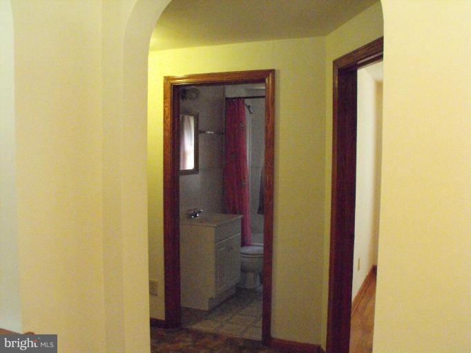 116 Paw Paw Road North Bloomery, WV 26817 - Photo 6 of 16 a view of a bathroom from a hallway
