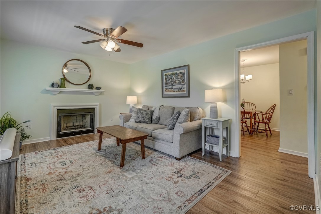 1101 Red Hawk Road Henrico, VA 23229 - Photo 4 of 29 Comfortable living room with fireplace, large wind