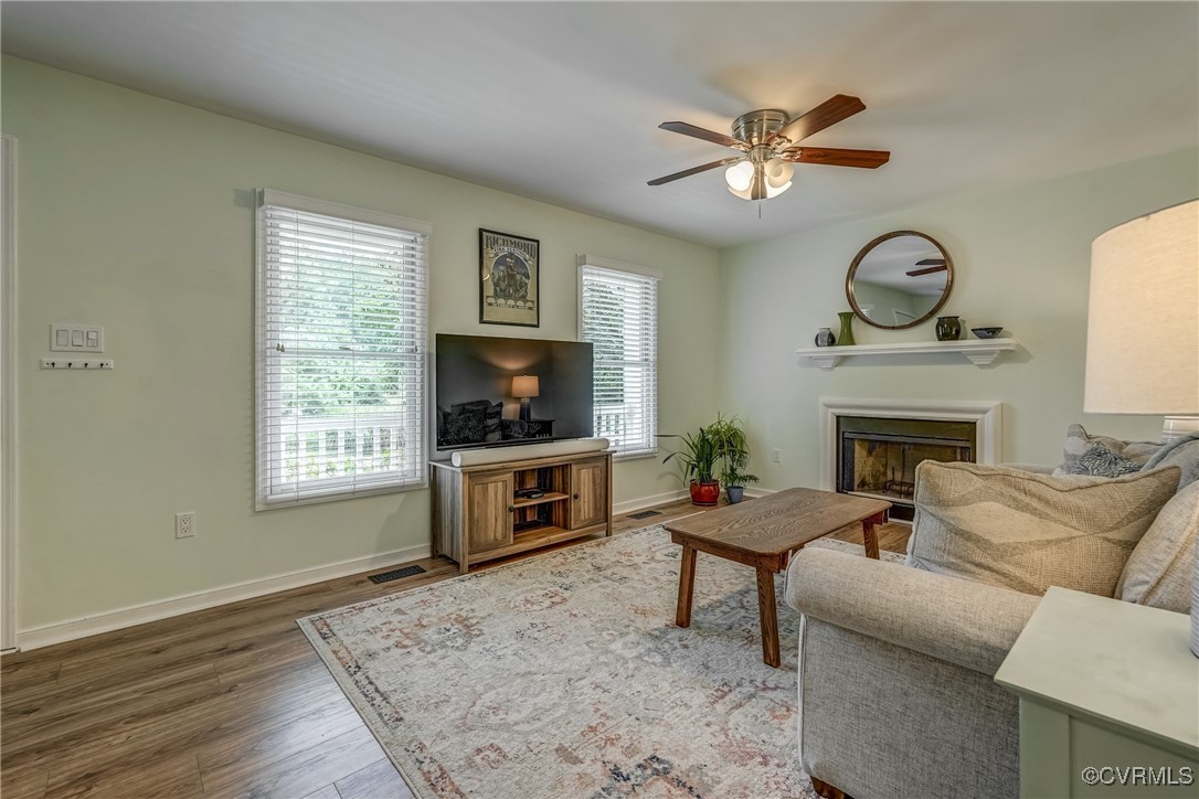 1101 Red Hawk Road Henrico, VA 23229 - Photo 5 of 29 Comfortable living room with fireplace, large wind
