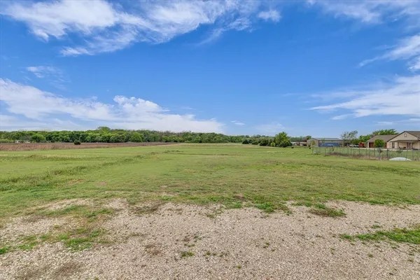 a view of a lake with a city