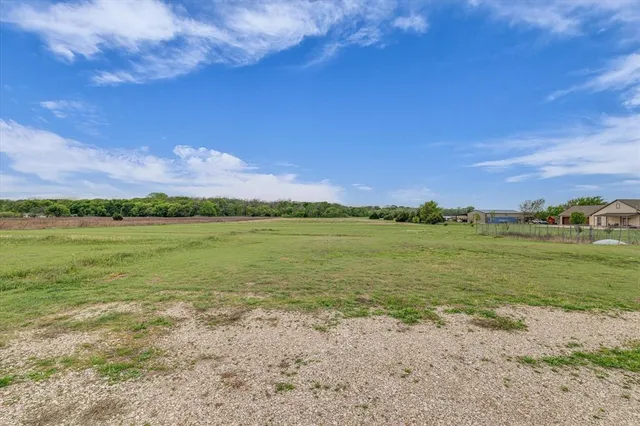 a view of a lake with a city