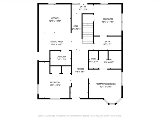 a picture of a bench in front of a wall