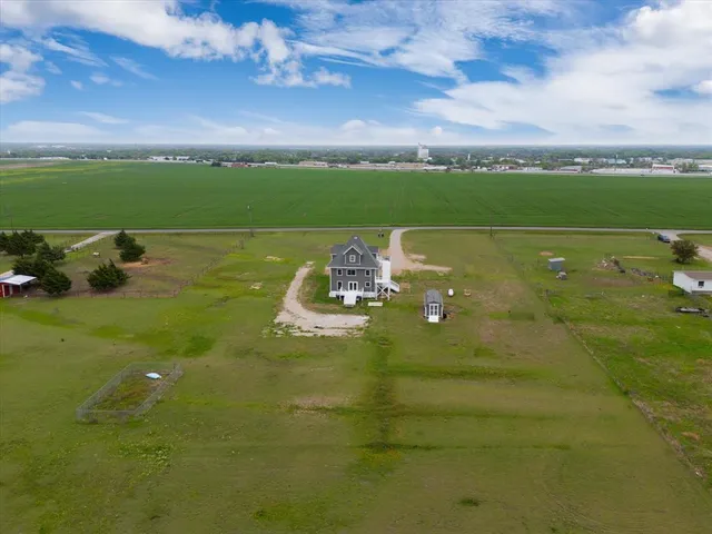 a view of a golf course with a lake