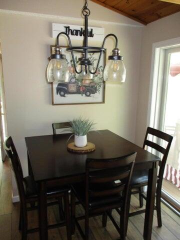 50 Northwest River Road Sebago, ME 04029 - Photo 14 of 33 Table next to Slider to Deck