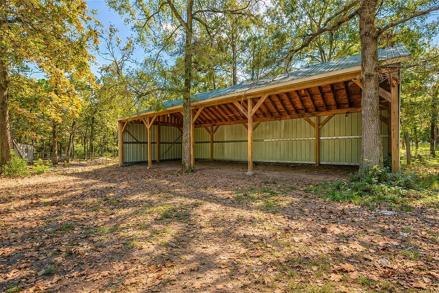 157 Oates Brothers Road Trinity, TX 75862 - Photo 2 of 10 a view of a house with a yard