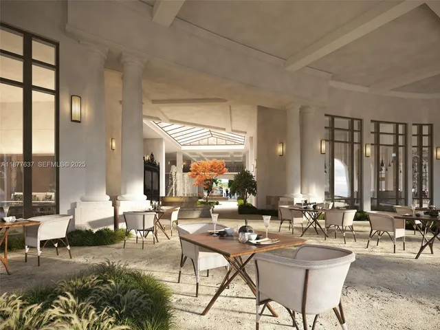 a view of pool with water fountain and trees