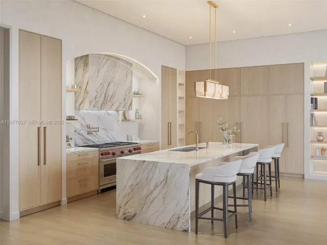 a kitchen with a stove a refrigerator and a dining table