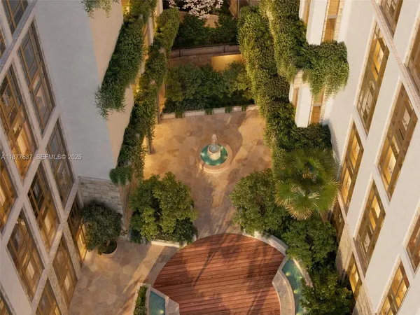 an aerial view of garden with swimming pool