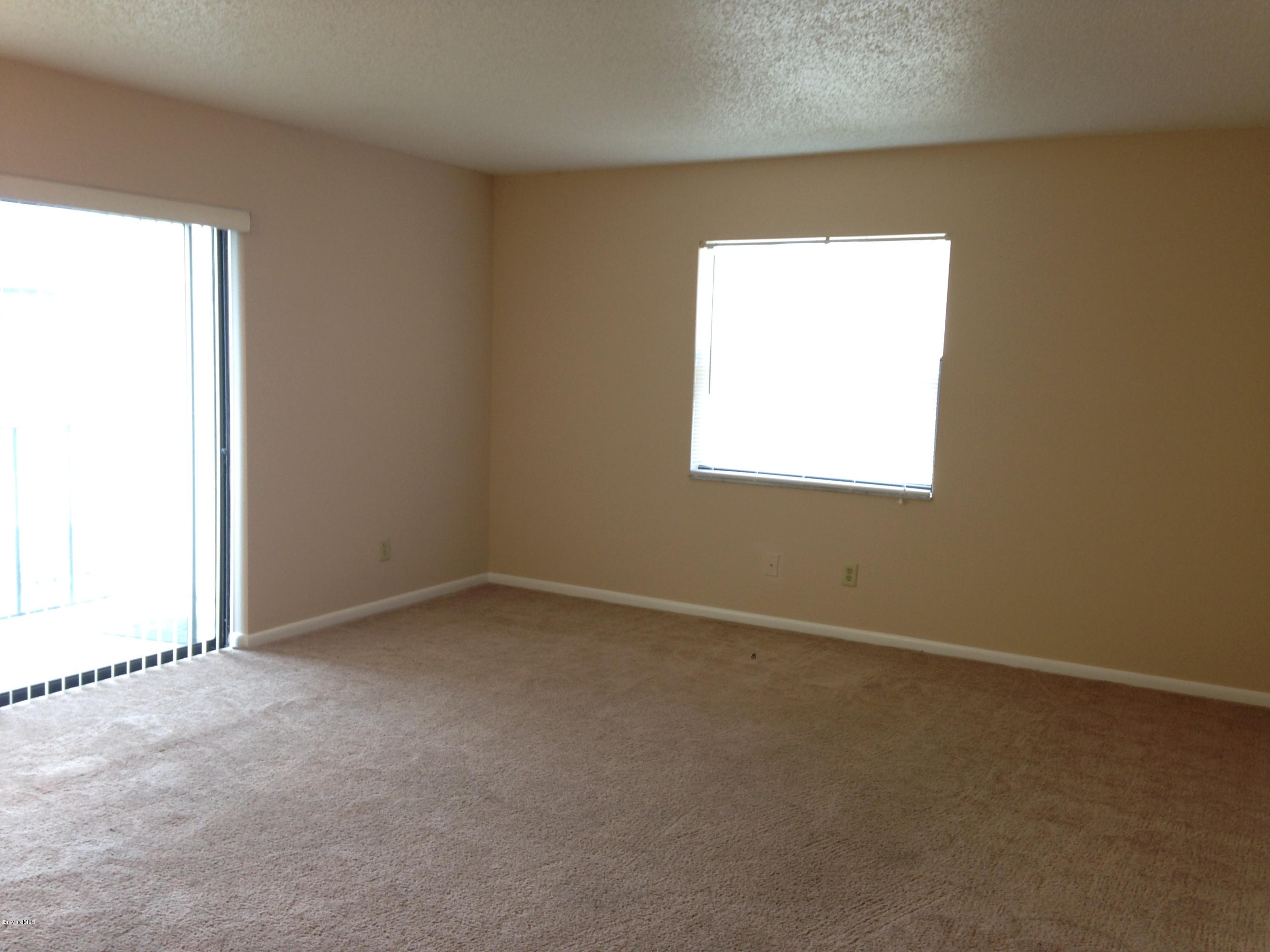 592 North Wickham Road, Unit 10 Melbourne, FL 32935 - Photo 4 of 15 Living Room