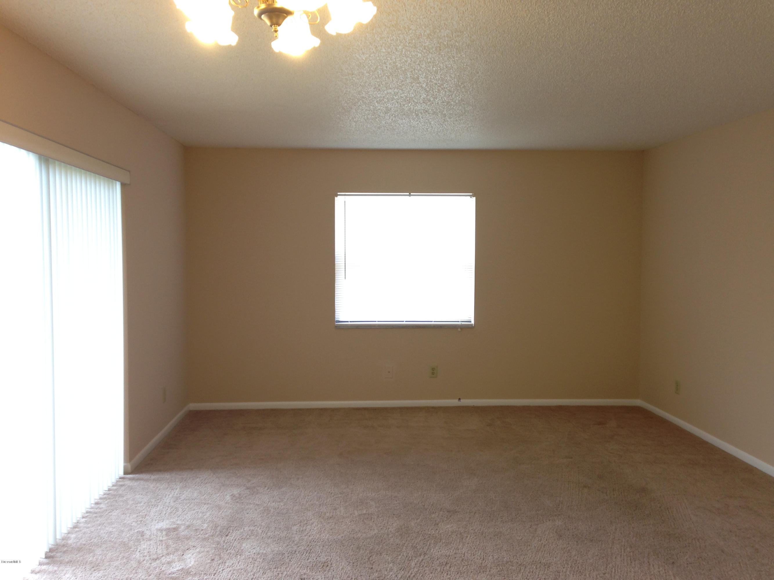 592 North Wickham Road, Unit 10 Melbourne, FL 32935 - Photo 6 of 15 Living Room