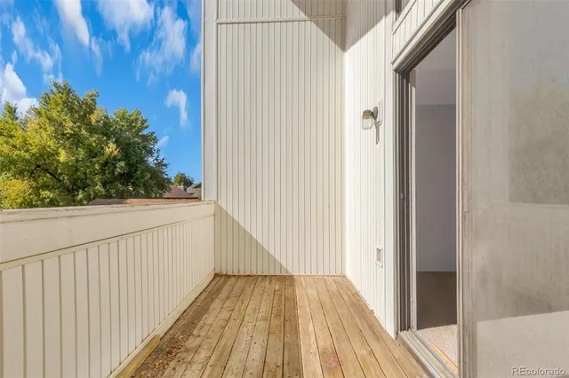 a view of a bedroom from a hallway