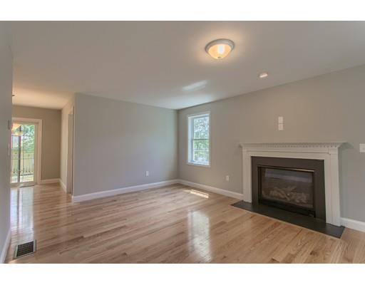 19 Goodale Street Haverhill, MA 01830 - Photo 14 of 30 a view of an empty room with window and fire place