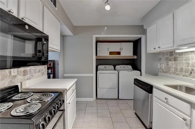 a kitchen with a stove and a sink