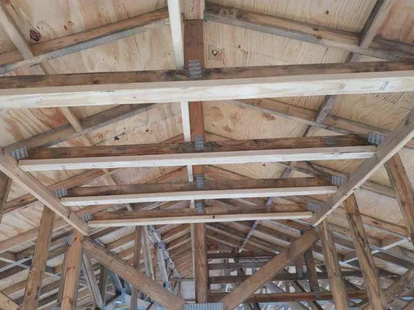 a view of a hall with wooden roof