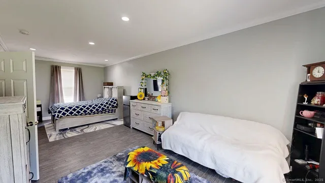 a bathroom with a bathtub and shower