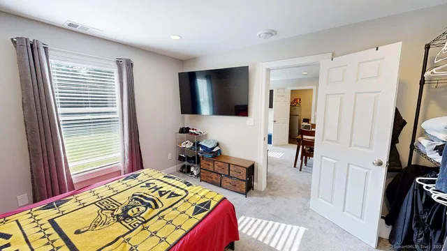 a bathroom with a shower and a toilet