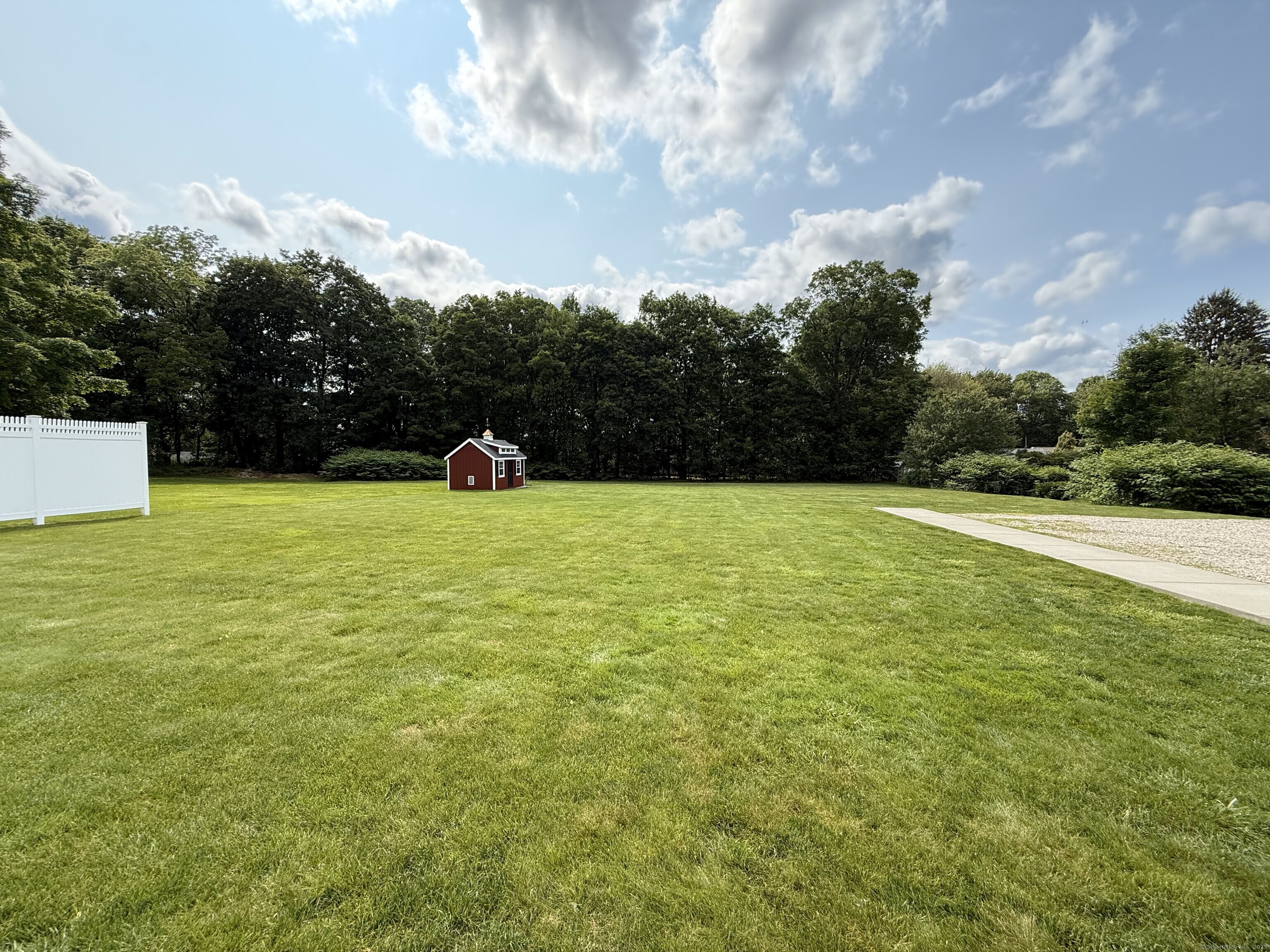 435 Maple Avenue Cheshire, CT 06410 - Photo 4 of 37 a view of pool with lawn chairs and large trees
