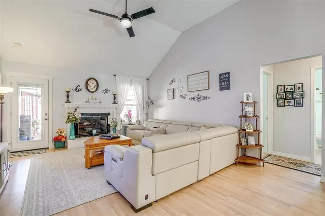 a bed room with a bed and a chair